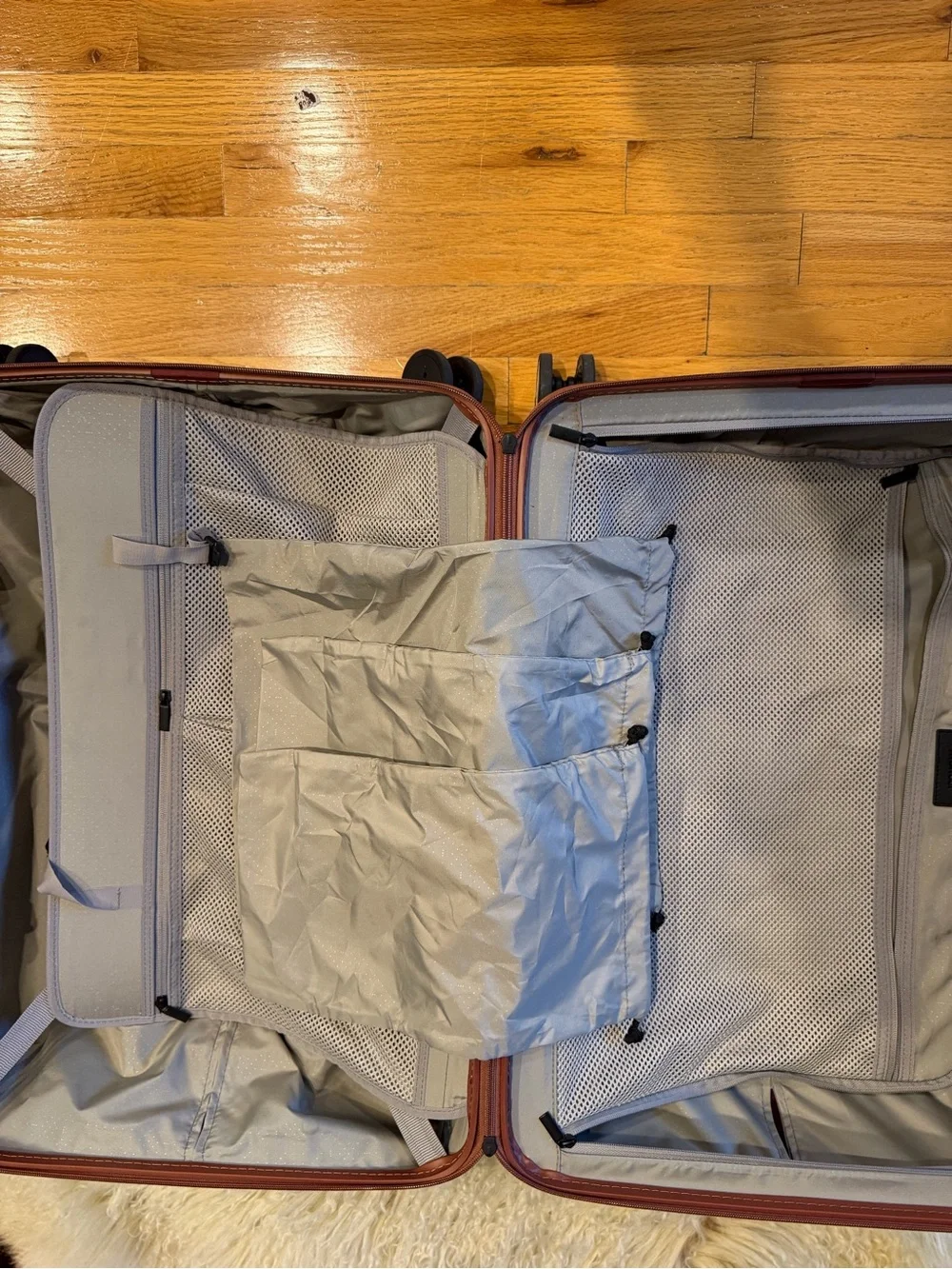 Monos medium check in 24” terracotta color suitcase LIKE NEW